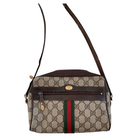 gucci vintage gg shoulder bag with push closure|gucci vintage suede bag.